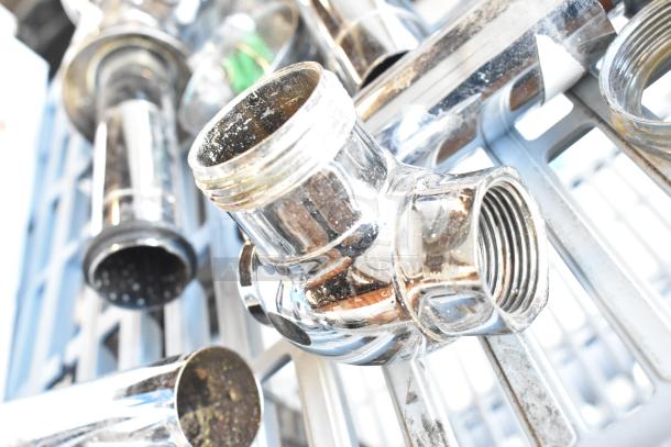 Chrome flushing handles, lightly tarnished, threaded ends, suitable for plumbing fixtures. Three pieces in auction lot.