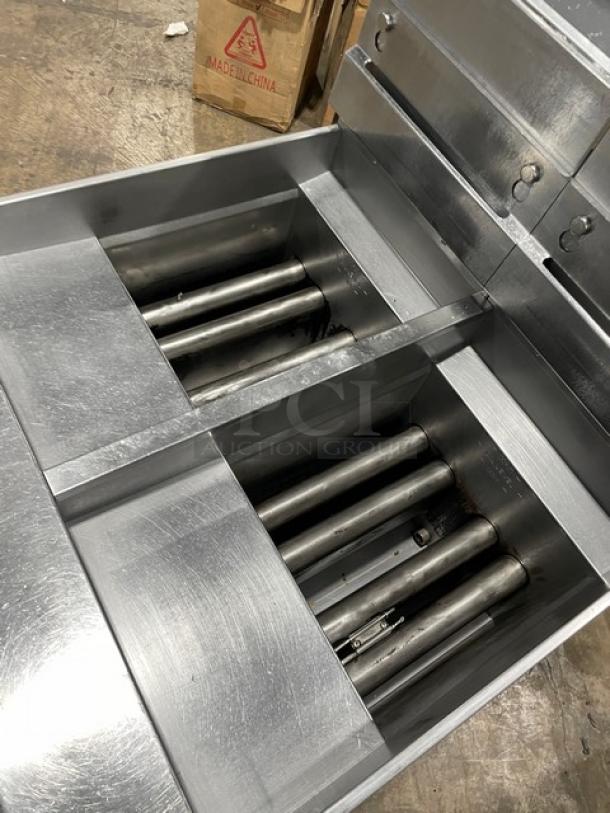 Pitco Solstice Supreme SSH55 commercial fryer, 2-bay, stainless steel, with filtration system, on casters. Energy Star certified.