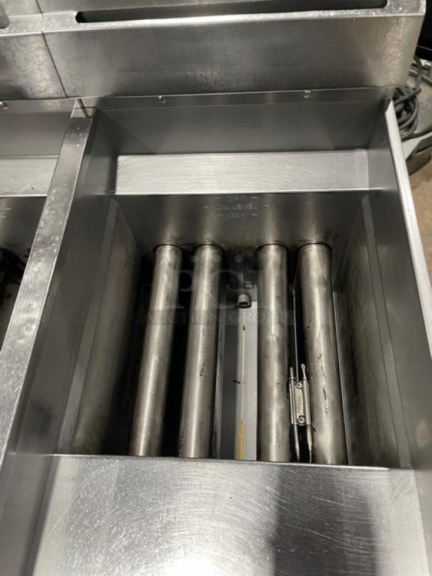 Pitco Solstice Supreme Series SSH55 stainless steel 2-bay fryer, natural gas, 50 lb. capacity, Energy Star certified, with filtration system.