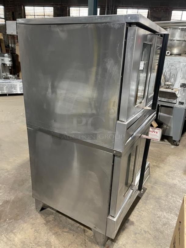 SunFire ICOE10M stainless steel double convection oven, electric, 208V 3-phase, includes wired rack, on legs, visible wear.