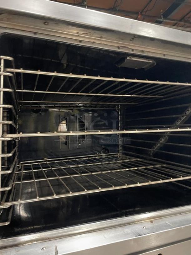 SunFire ICOE10M stainless steel double convection oven interior with wire racks, 208V 3-phase, on legs. Model: ICOE10M.