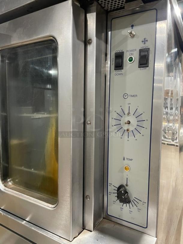 SunFire stainless steel double stacked convection oven, model ICOE10M, with control panel and wired rack. 208V 3 Phase.