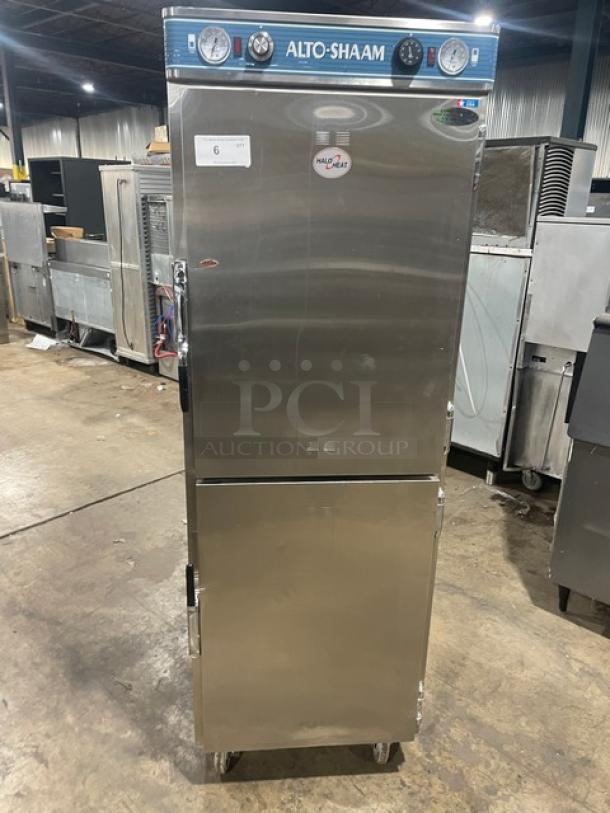 Alto-Shaam 1200UPSR stainless steel heated holding cabinet, dual-compartment, with dutch doors and controls, on casters.