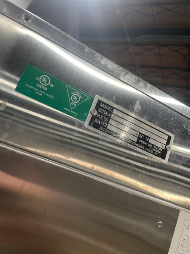 Alto-Shaam 1200UPSR heat cabinet, stainless steel, dual-compartment, Dutch door, serial number 235006-0903, UL listed label.