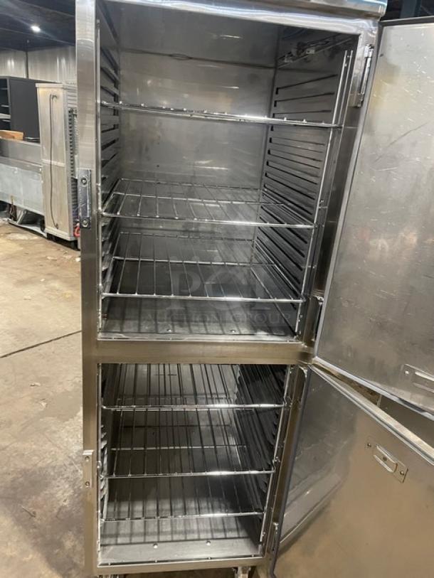 Alto-Shaam 1200-UP/SR stainless steel heated holding cabinet with dual compartments, chrome racks, on casters.