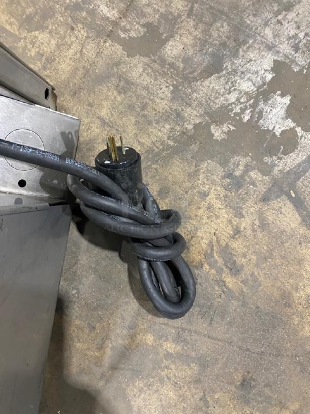 Hobart Advansys LXEC undercounter dishwasher with power cord visible, stainless steel body, Energy Star certified.