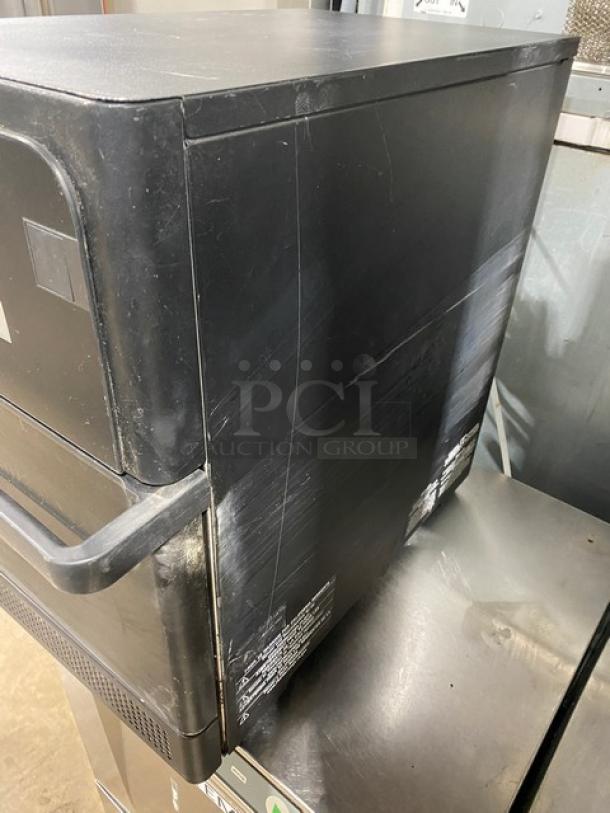 MerryChef late model black electric countertop rapid cook oven, 208/240V, in good condition, showing minor wear.