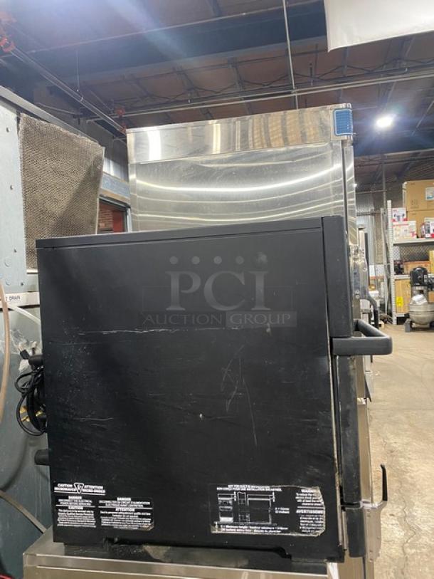 MerryChef commercial black electric rapid cook oven, late model, countertop design, 208/240V, visible labels, used condition.