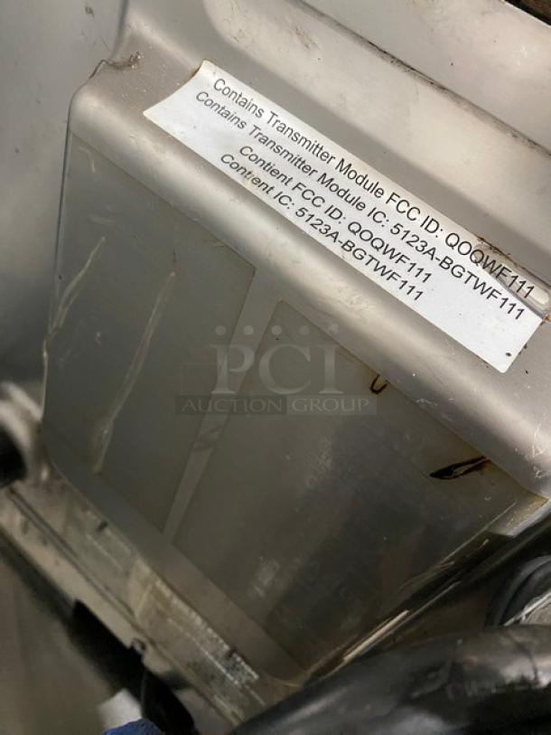 MerryChef high-speed rapid cook oven with FCC ID and IC labels. Electric powered, black, late model, 208/240V.