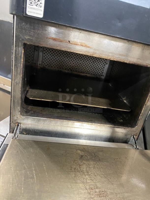 MerryChef commercial black electric rapid cook oven, late model, countertop style, 208/240V, visible signs of use.
