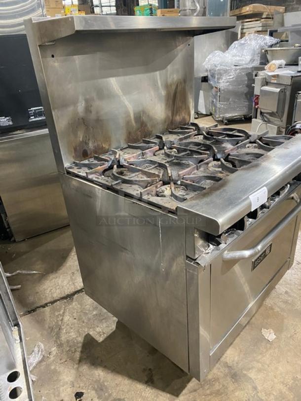 Asber commercial stainless steel 6-burner gas range/oven combo with backsplash, overhead salamander shelf, and wired oven rack.
