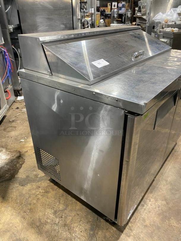 Turbo Air stainless steel 2-door refrigerated prep table, model MST-48-N, with poly coated rack, on casters.