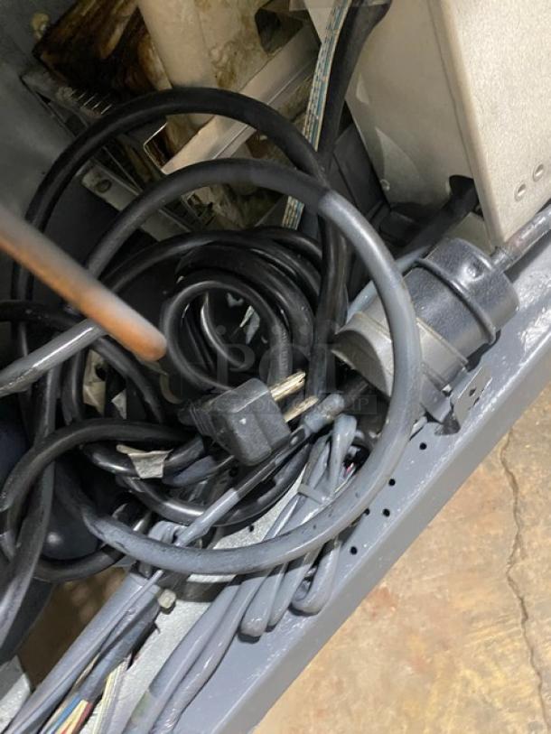 Close-up of electrical cords and components for Turbo Air MST-48-N refrigerated prep table. Cords appear intact.