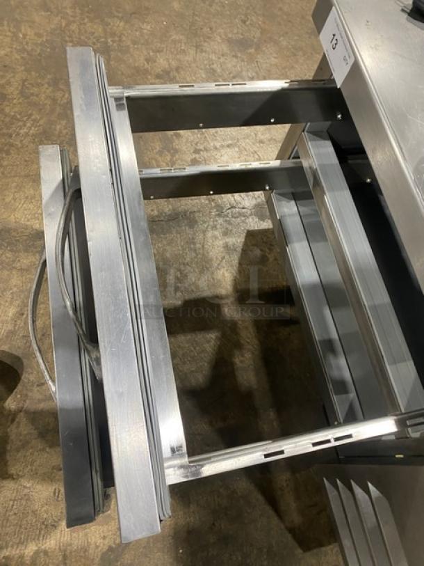 Beverage-Air stainless steel 2-drawer refrigerated chef base, model WTRCS3610003, on casters, shown open, in good condition.