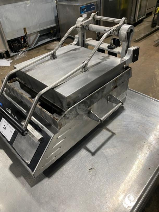 Star Pro Max Series GR14B stainless steel electric panini press, dual-sided smooth plates, 120V, commercial use, on legs.