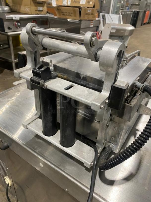 Star Pro Max GR14B stainless steel panini press with dual-sided smooth plates on legs. Model: GR14B SN: GS140910A0042, 120V.