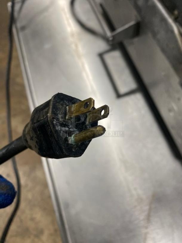 Close-up of a power plug for the Star Pro Max Series GR14B panini press grill. 120V, used condition.