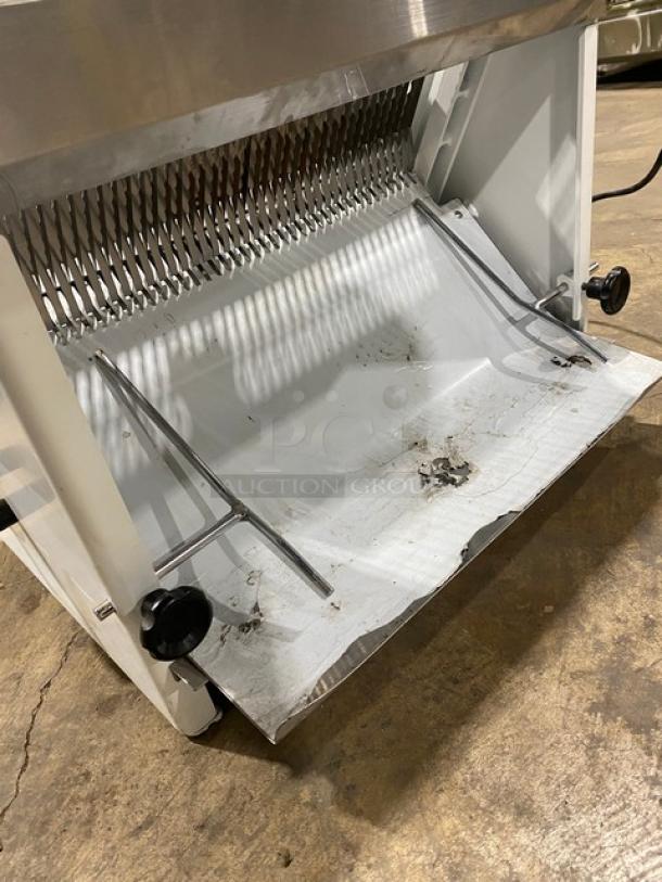 Twothousand TT-D7B bread slicer, white powder-coated stainless steel, countertop model, 110V, shows wear and residue.