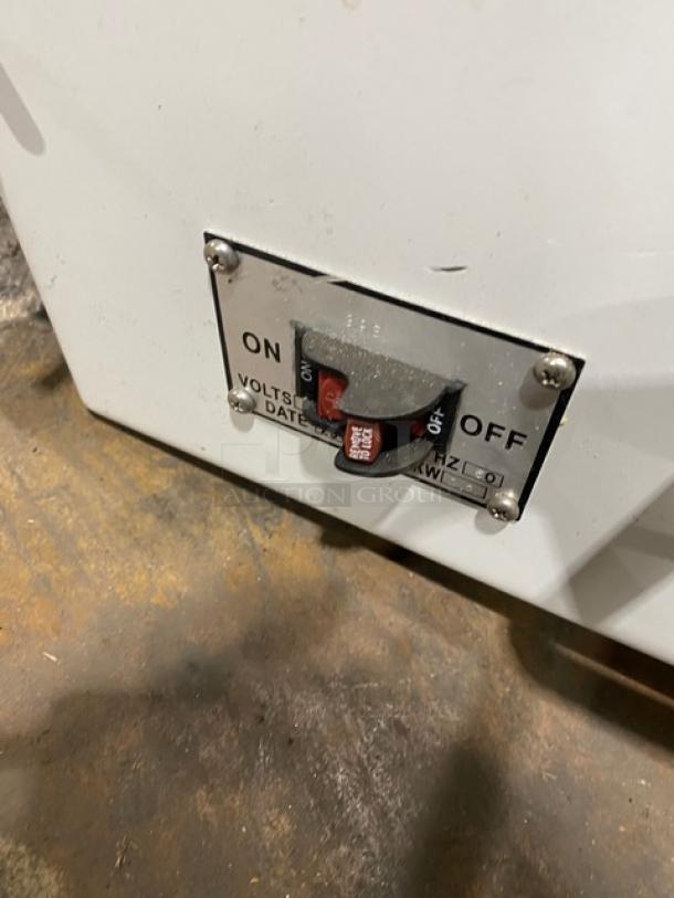 Twothousand TT-D7B 12mm bread slicer in white powder-coated stainless steel, electric-powered, on/off switch visible.