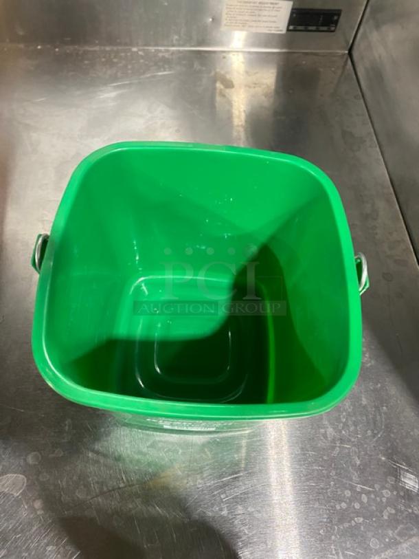 San Jamar KP196GN green 6 qt. detergent pail with handle, new condition, ideal for commercial use.