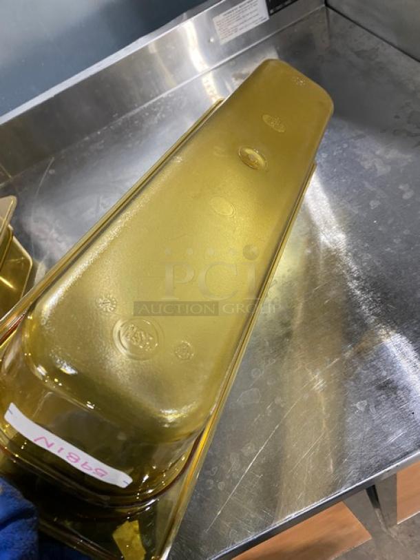 NEW Cambro amber high-heat half-size food pan, 4" deep. Commercial grade, excellent condition, with visible markings.