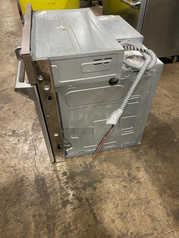 Samsung commercial stainless steel single wall built-in smart oven, features Flex-Duo divider, porcelain interior, wired rack.