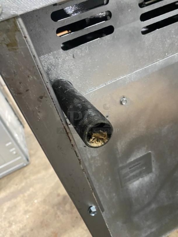 American Range commercial stainless steel 6-burner gas range/oven with overhead salamander shelf. Durable and efficient.