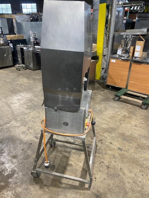 Jaccard E93 Stainless Steel Electric Meat Tenderizer, heavy-duty, on casters, with open base stand, used condition.