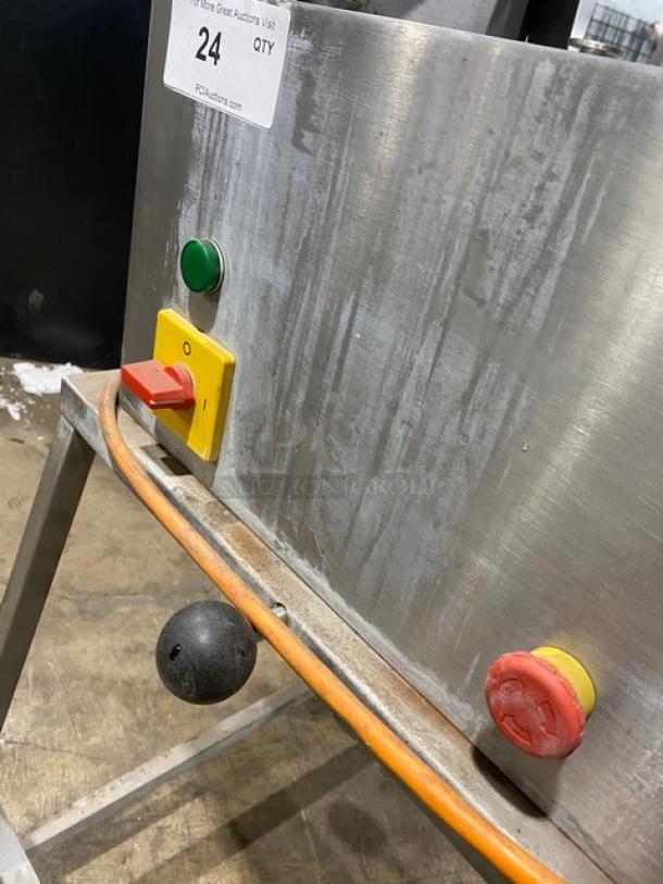 Jaccard E93 stainless steel electric meat tenderizer with open base stand, model E93 SN: B2280, on casters, with control panel.