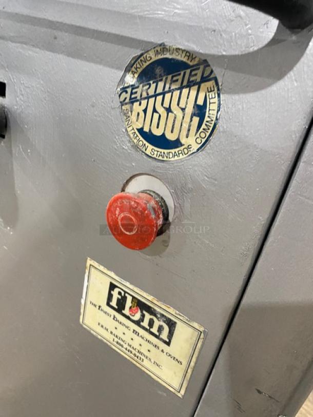 Panimatic P84-S commercial dough divider with certification and safety labels, on casters, good condition.