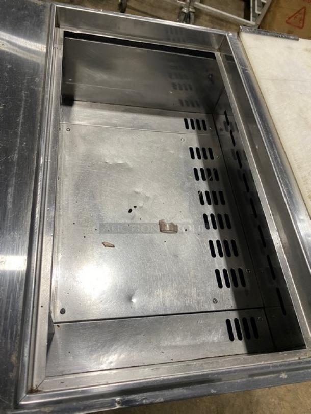 Turbo Air TST-28SD refrigerated salad prep table, stainless steel, with cutting board, on casters, 115V, good condition.
