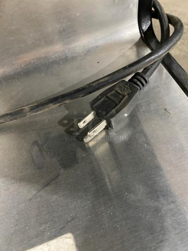 Star HPDE2 condiment warmer with push button control. Black powder-coated stainless steel, electric, 120V. Plug detail shown.