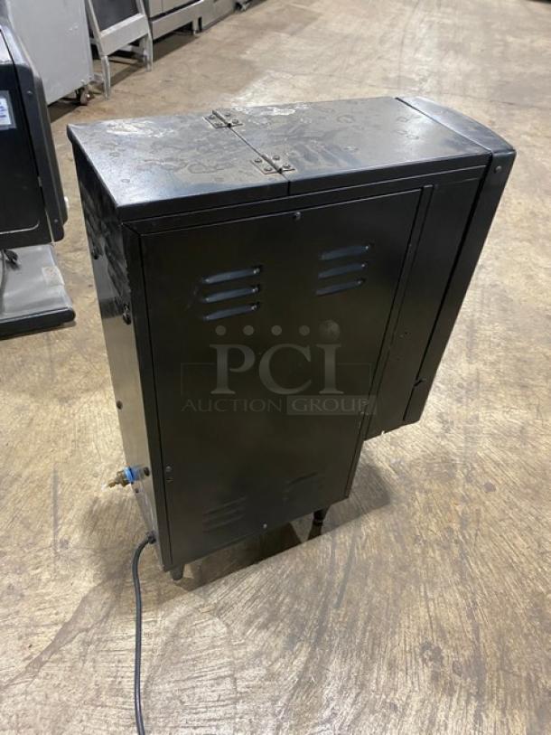 Cecilware GB2K-LD commercial black electric countertop dual flavor hot beverage machine, with 2 hoppers and push-button control, 120V, on legs.