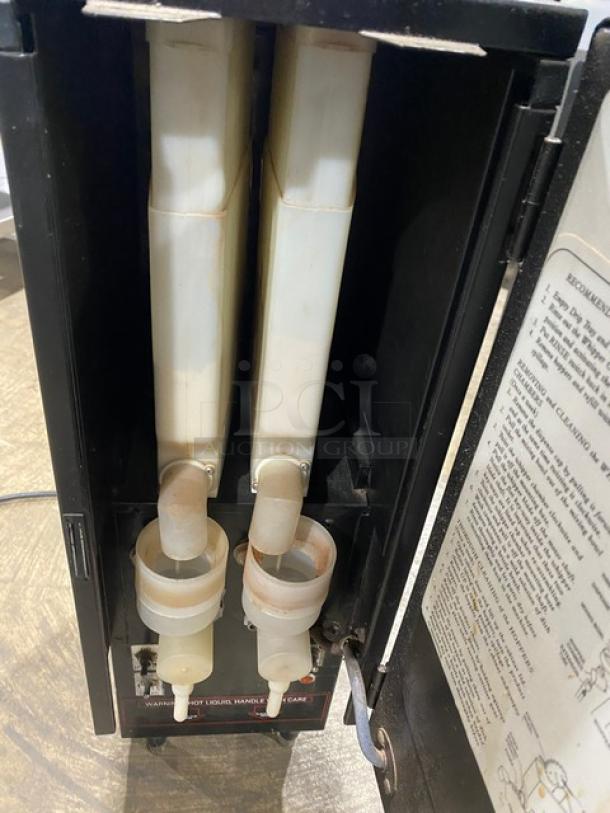 Cecilware GB2KLD dual flavor cappuccino machine, black, 2 hoppers, push button control, electric, 120V, on legs.