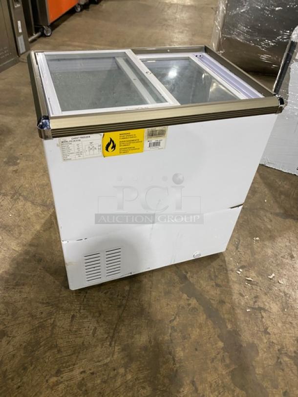 Omcan commercial display freezer, model FR-CN-0150, with double glass sliding lid, 110V, in used condition.