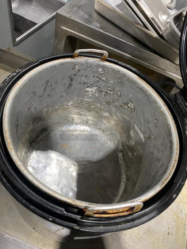 Amko stainless steel electric rice warmer, model AK-ERW7, 20L capacity, used condition, visible interior wear.