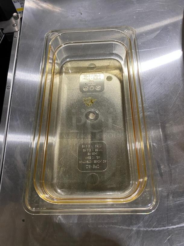 Cambro amber high-temp food pan, model 32HP150, 1/3-size, 2-1/2" deep. New condition, clear labels visible, commercial-grade.
