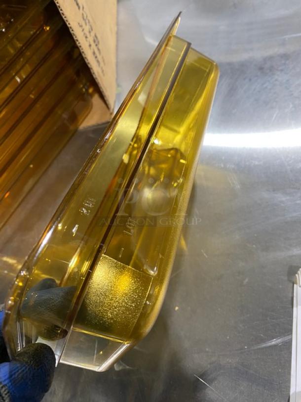 Cambro 32HP150 commercial amber food pan, 1/3-size, 2-1/2" deep; new condition; high-temperature resistant.