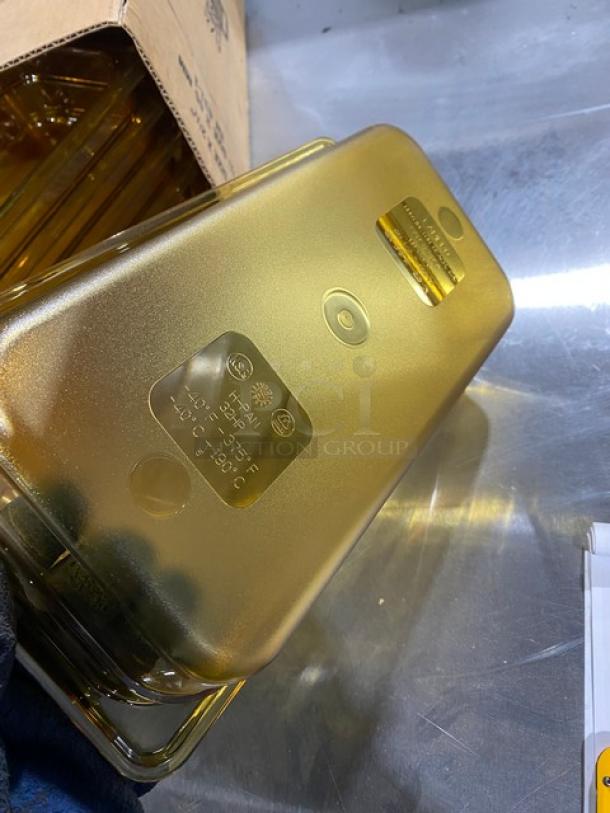 Cambro 32HP150 amber food pan, 1/3-size, high-temperature, 2.5" deep. New condition. Markings show heat tolerance and model info.