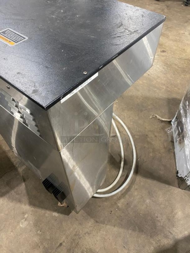 Bunn ThermoFresh DBC Series dual coffee brewer, stainless steel, with hot water dispenser, model DUALTFDBC, on legs.