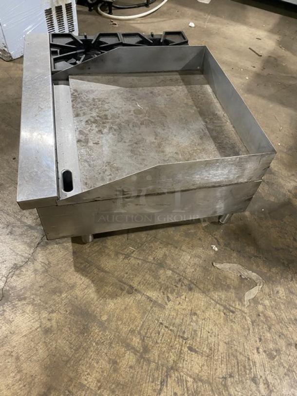 Comstock-Castle stainless steel 2-burner countertop griddle range, Model FHP3624. Features back and side splash, on legs.