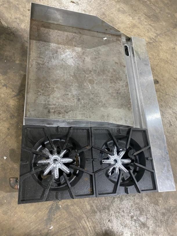 Comstock-Castle stainless steel 2-burner griddle range, model FHP36-24, with back and side splash, on legs.