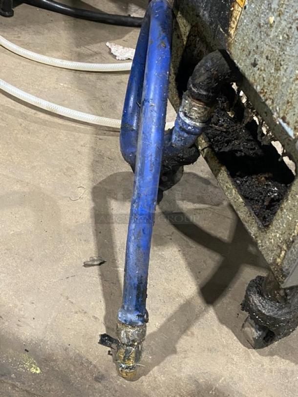 Pitco VF35 commercial stainless steel gas fryer with backsplash, basket hanger, and caster wheels. Model: VF35.