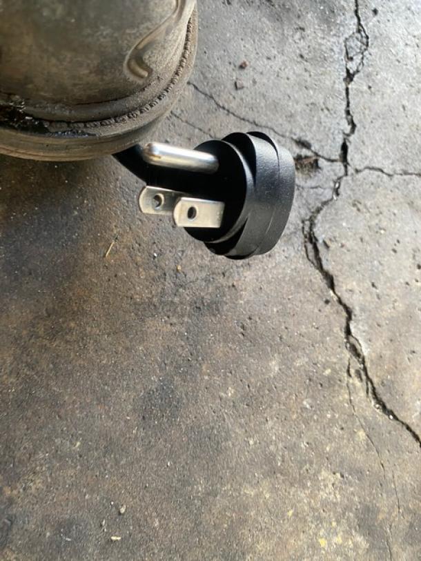 Vendo stainless steel countertop hot food merchandiser, featuring slanted glass and rear sliding doors. Electric powered, 115V, 1 phase.