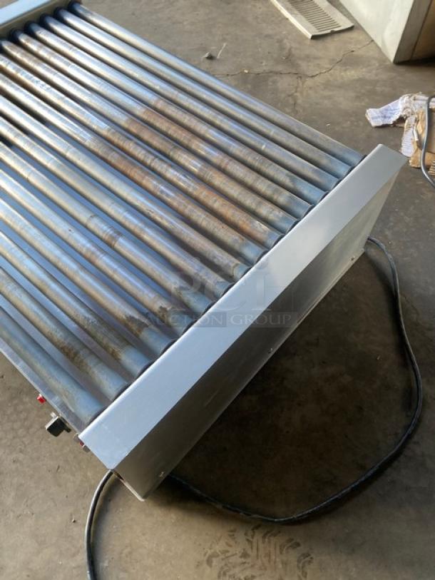 Nemco stainless steel 75-dog hot dog roller grill, model 8075SX208SP, with non-stick rollers, 208V, on legs.