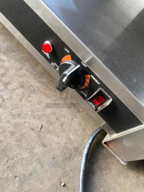 Nemco 8075SX208SP hot dog roller grill, stainless steel, non-stick rollers, temperature controls, 208V, on legs.