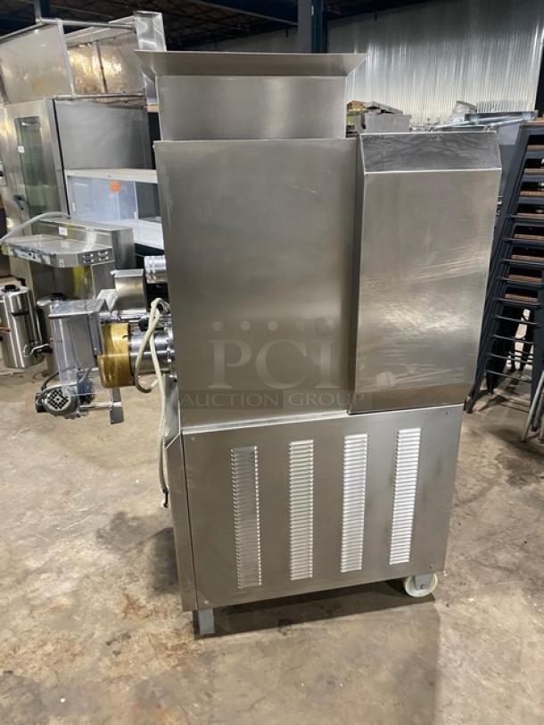 Italgi P80A industrial pasta extruder, stainless steel, electric, 230V 3-phase, free-standing on legs and casters, excellent condition.