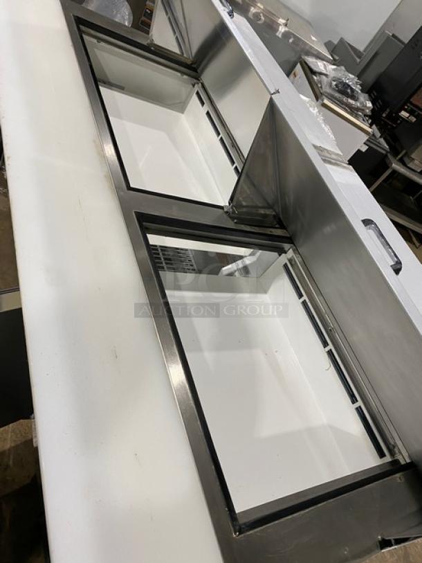 Kool-It Ikon Series 3 Door Refrigerated Prep Table, Model KSP72M, stainless steel, with cutting board, poly-coated rack, on casters.