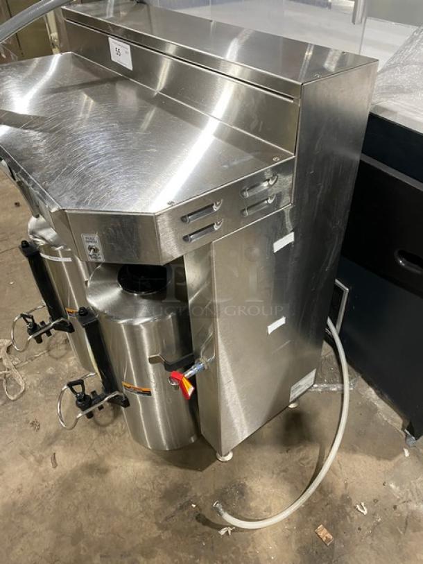Fetco CBS62H 2019 stainless steel commercial coffee brewer, twin 3-gallon capacity, hot water dispenser, insulated thermal dispensers, on legs.