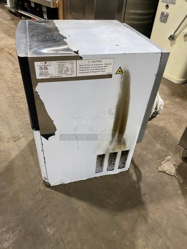 Spartan SUIM-120-HC undercounter ice maker, stainless steel, electric, visible wear, 2020 model, 115V, with caution label.